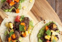 Southwestern Steak Tacos with Roasted Corn & Chipotle Lime Slaw