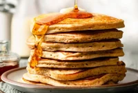 Eggnog Pancakes with Warm Cinnamon Maple Syrup