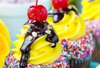 Banana Split Cupcakes with Cherry Topping and Whipped Cream