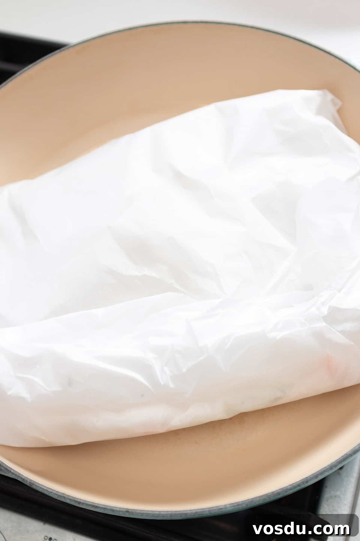 Steamed Salmon with Fresh Herbs and Lemon: Quick Flavorful Recipe 7 A bundle of parchment paper.