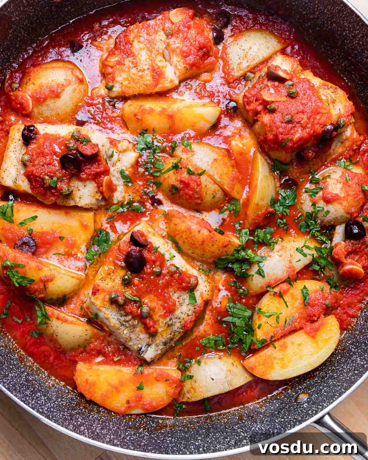 Neapolitan-Style Baccalà: Classic Salted Cod Recipe from Naples 9 Overhead shot of baccala anna Napoletana in grey saute pan.