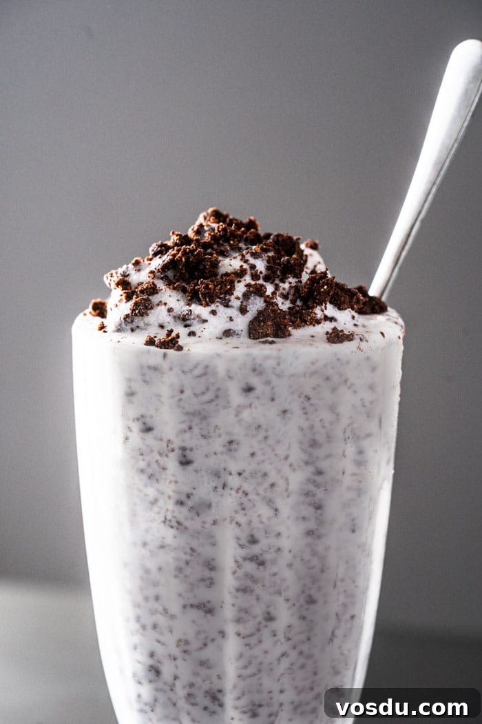 15-Minute Cookies ’N Cream Milkshake — Gluten-Free, Dairy-Free, Keto 2 Keto cookies cream milkshake with extra 'Oreo crumbs' on top