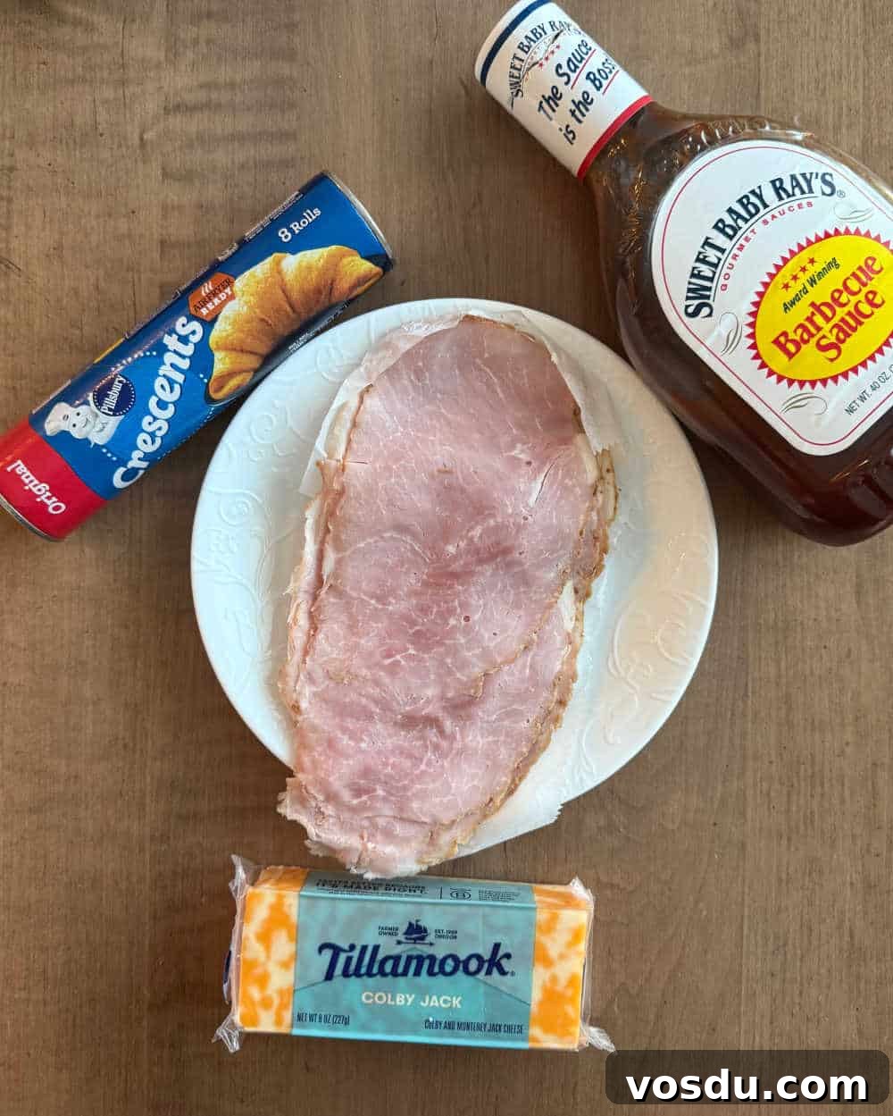 Ham and Cheese Crescent Roll-Ups Baked to Golden Perfection 3 sliced ham, crescents, bbq sauce and cheese
