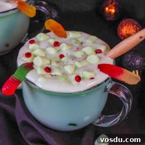 Witches' Brew Halloween Hot Chocolate Recipe for Spooky Nights 8 Halloween hot chocolate in a clear mug with a black background