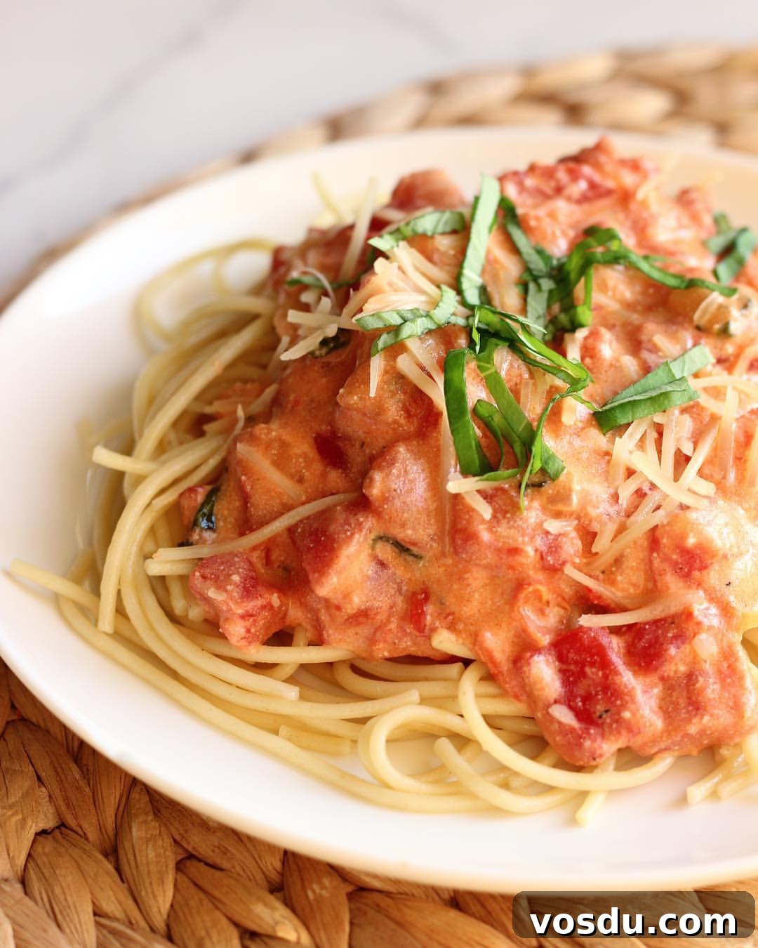 Spaghetti with cheesy tomato cream sauce