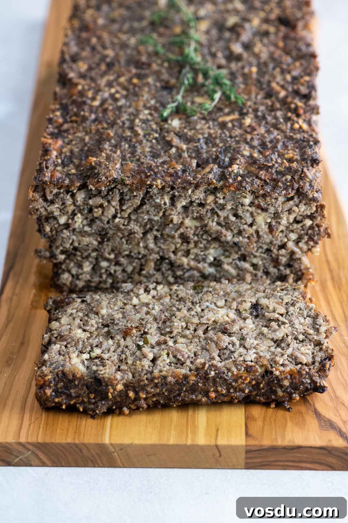 Savory Vegetarian Nut Roast Meatloaf Recipe 5 veggie meatloaf (nut loaf) on a platter