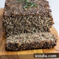 Savory Vegetarian Nut Roast Meatloaf Recipe 7 veggie meatloaf (nut loaf) on a platter