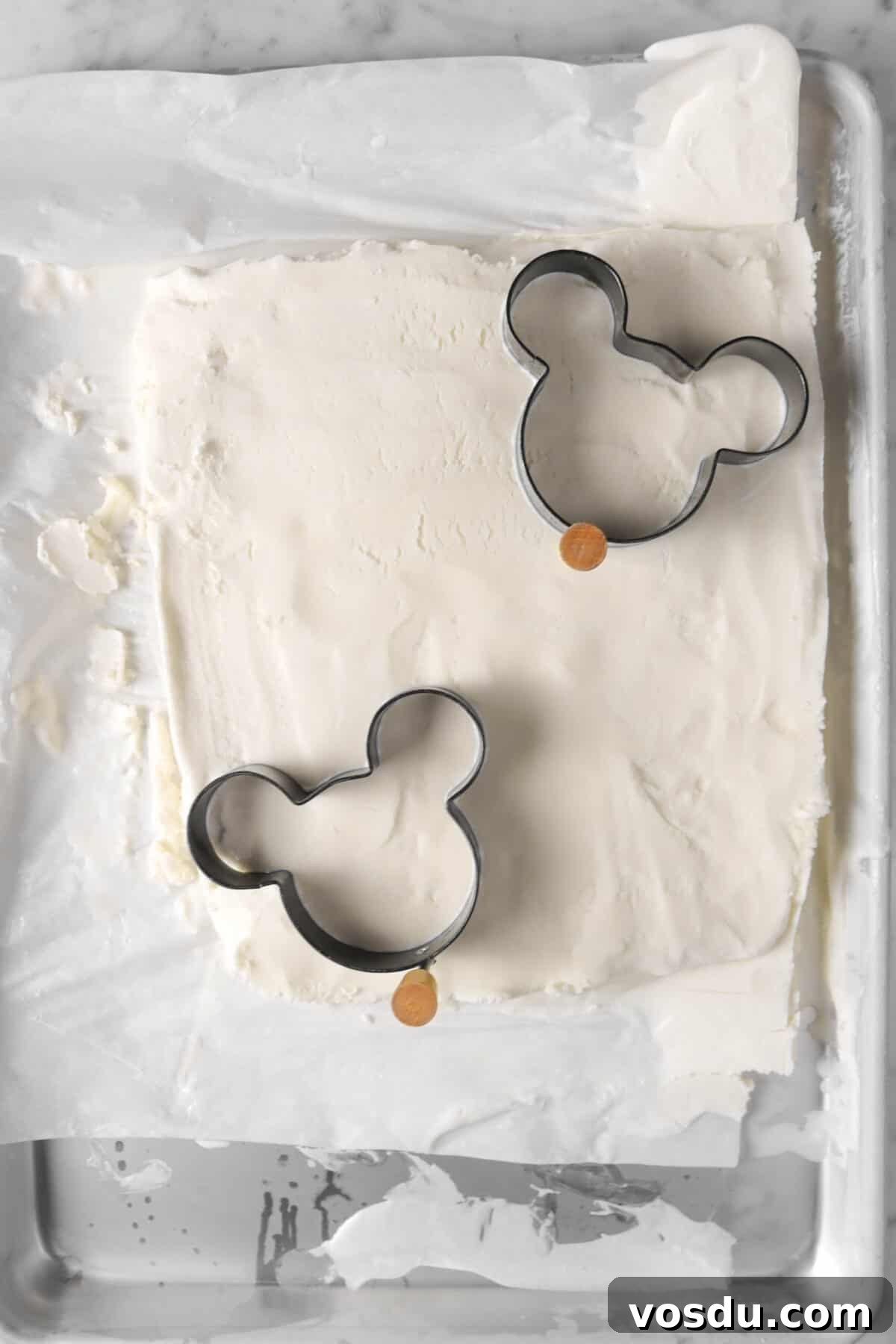 Mickey Mouse Ice Cream Bars: Where to Buy & Nutrition Facts 8 two mickey shaped cutters on vanilla ice cream