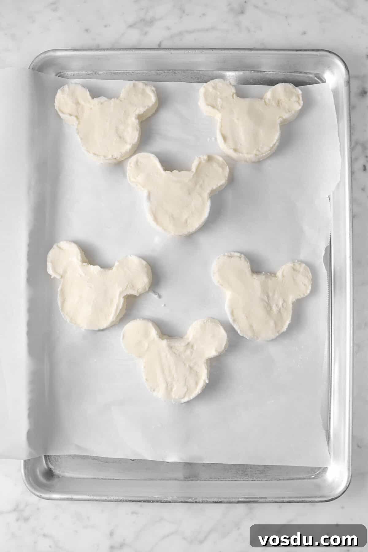 Mickey Mouse Ice Cream Bars: Where to Buy & Nutrition Facts 9 mickey ice creams on a sheet pan
