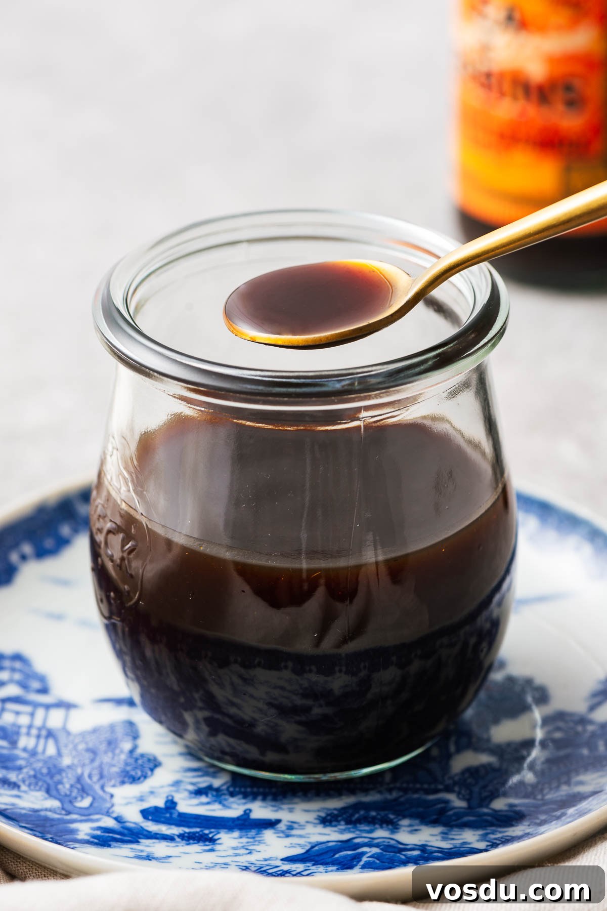 Homemade Yakisoba Sauce: Authentic Japanese Noodle Sauce Recipe 8 Homemade yakisoba noodle sauce in a glass jar with a saucy consistency.