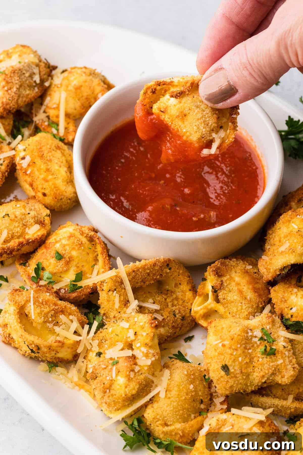 Crispy Air-Fried Tortellini with Garlic Parmesan Dipping Sauce 9 a crispy air fryer tortellini with pizza sauce dip