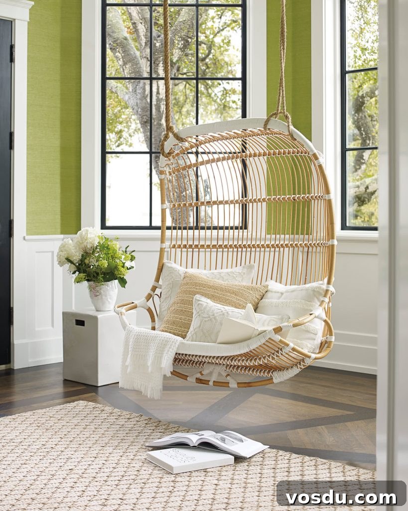 9 Stylish Hanging Rattan Chairs You’ll Love 11 a double hanging rattan chair