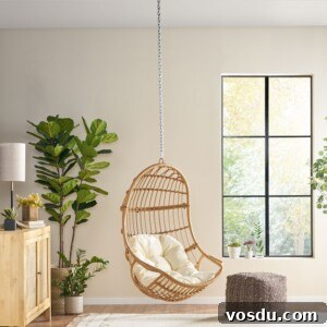 9 Stylish Hanging Rattan Chairs You’ll Love 12 a living room
