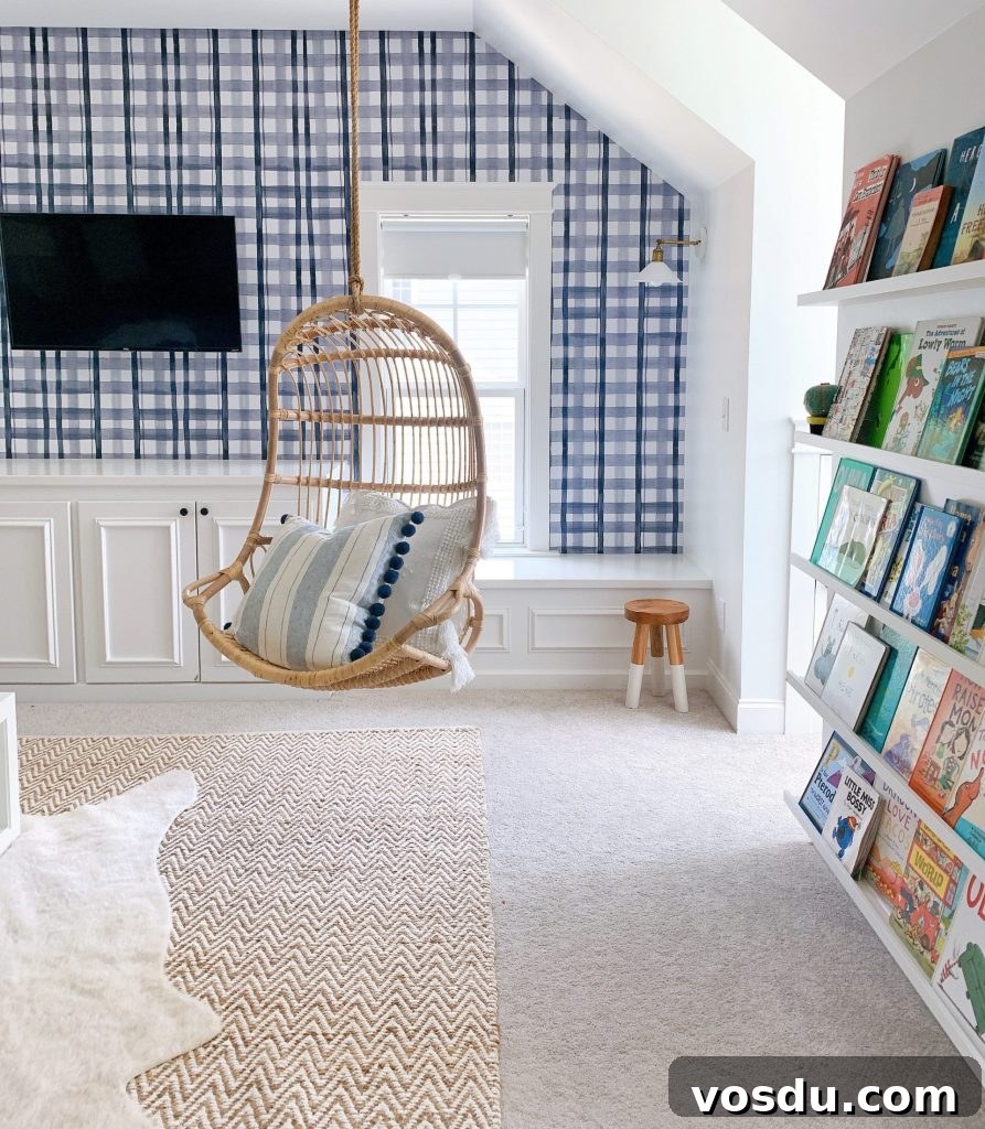 9 Stylish Hanging Rattan Chairs You’ll Love 6 a Serena and lily hanging rattan chair in a playroom