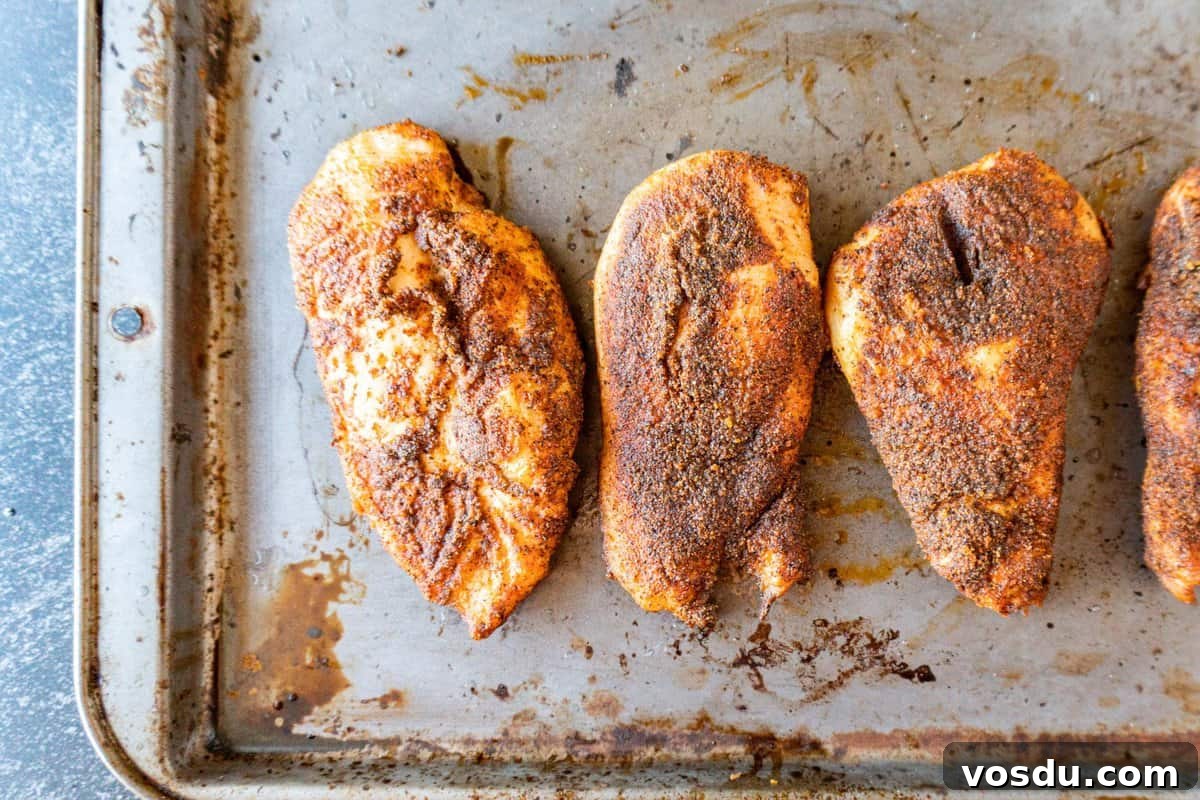 Juicy Smoked Chicken Breast Recipe for Tender, Flavorful Results 14 smoked chicken breast on baking sheet