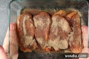 Juicy Smoked Chicken Breast Recipe for Tender, Flavorful Results 20 chicken breast with seasoning on it
