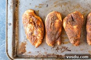 Juicy Smoked Chicken Breast Recipe for Tender, Flavorful Results 22 smoked chicken breast on baking sheet