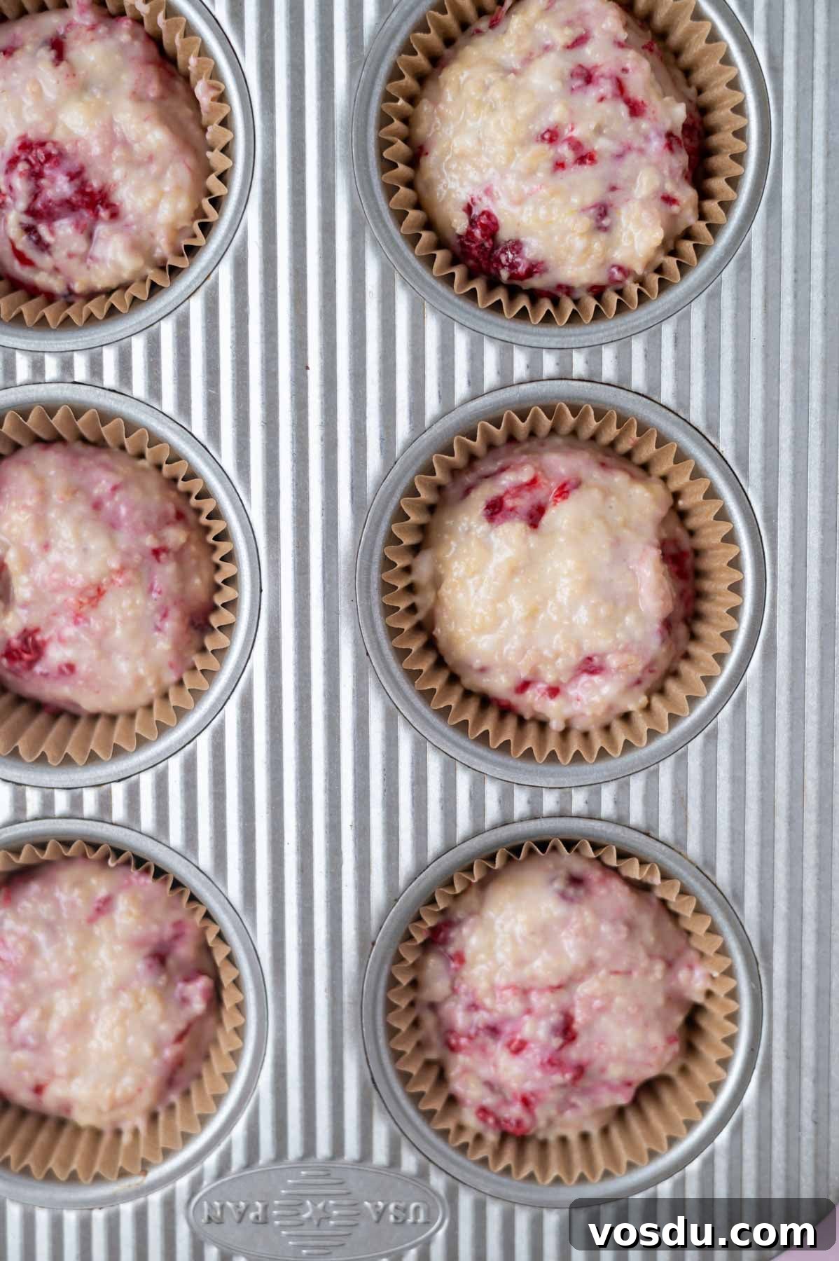 Lemon Raspberry Cupcakes Made from Scratch: Bright Citrus Dessert 8 batter in muffin liners in a pan