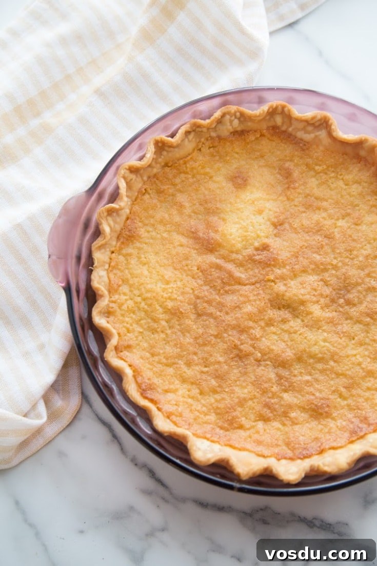 Southern Buttermilk Pie Recipe — Quick, Classic Dessert 5 finished buttermilk pie not cut into