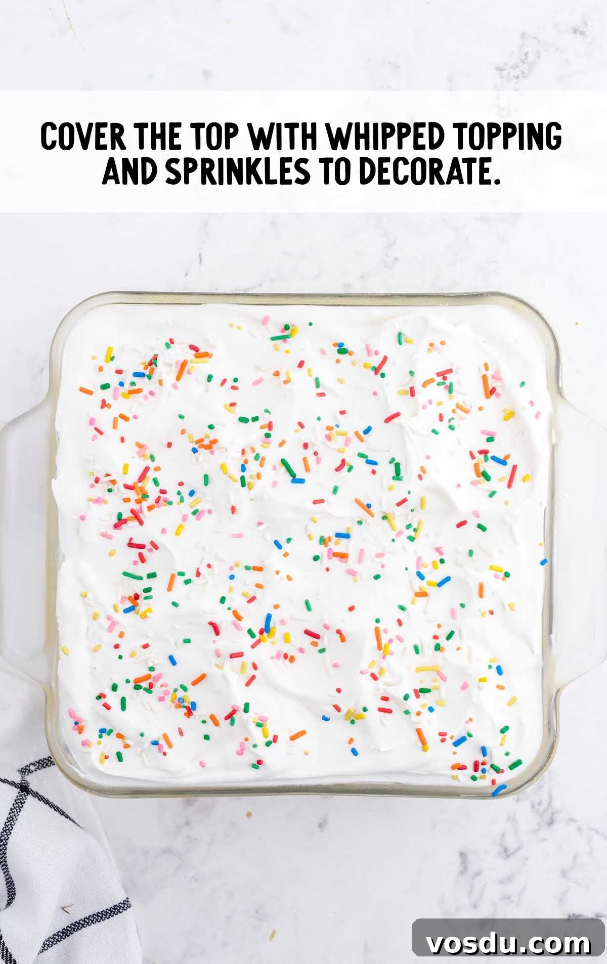 Delicious Birthday Cake Recipes for Every Celebration 7 sprinkles being topped over cake