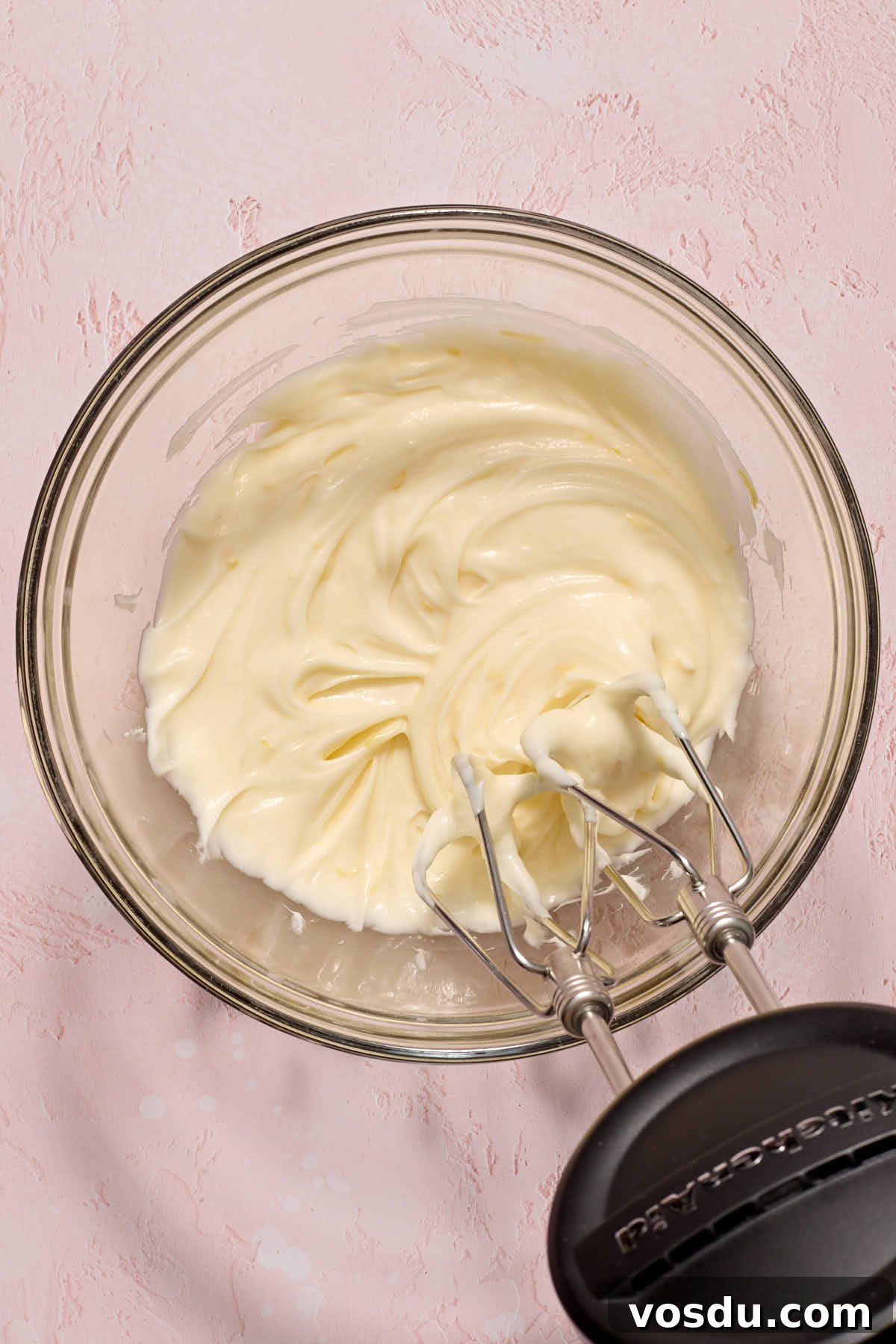 Almond Flour Lemon Poppy Seed Cake Recipe for Moist, Zesty Loaf 11 Cream cheese frosting mixed together in a bowl.