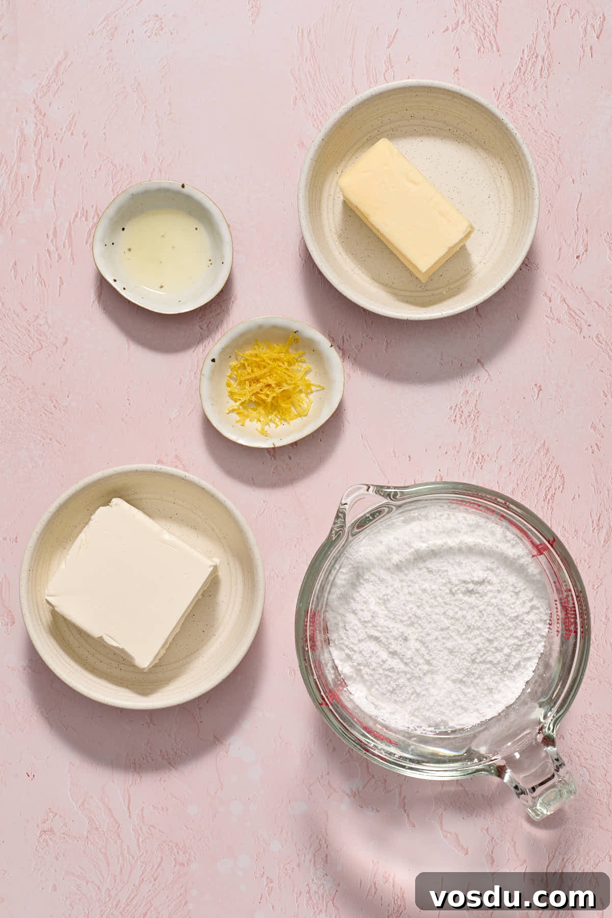 Almond Flour Lemon Poppy Seed Cake Recipe for Moist, Zesty Loaf 4 Ingredients to make lemon cream cheese frosting arranged individually.