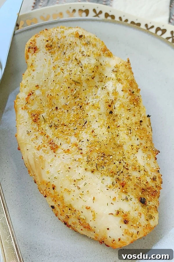 Juicy Air Fryer Chicken Breast Recipe for Quick Dinners 6 air fryer chicken breast on a plate
