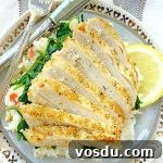 air fryer chicken breast sliced on a plate