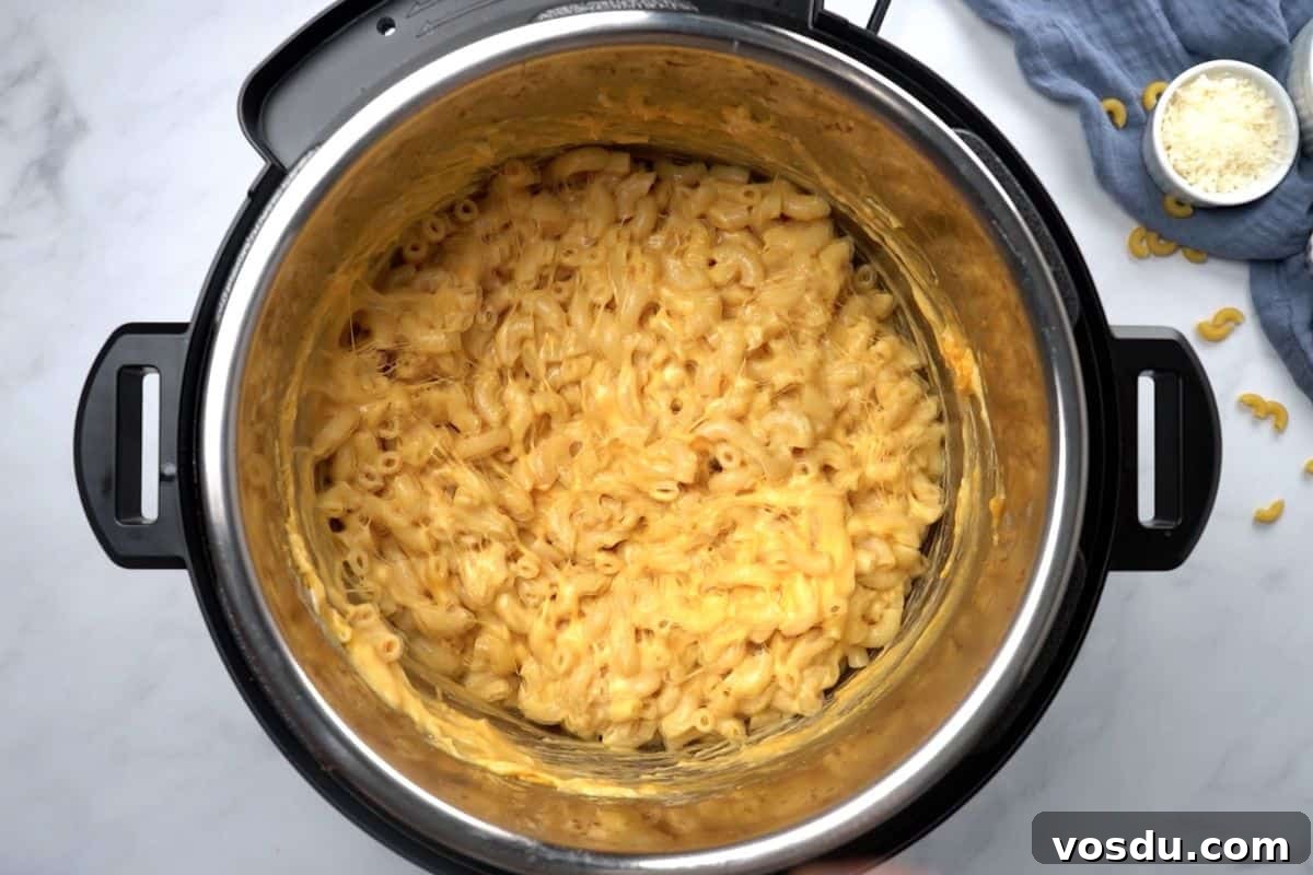 Macaroni and Cheese Instant Pot Macaroni and cheese after being prepared inside the inner pot of an electric pressure cooker.