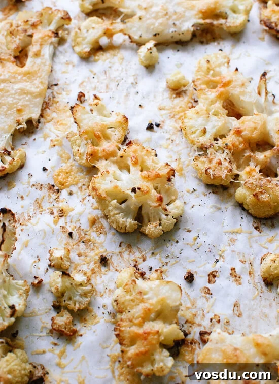 Parmesan-Crusted Cauliflower Steaks with Savory Marinara 6 Parmesan-crusted cauliflower - cookieandkate.com