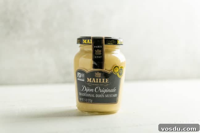 10 Essential Pantry Ingredients Every Home Cook Needs 4 Jar of Maille Dijon Mustard.
