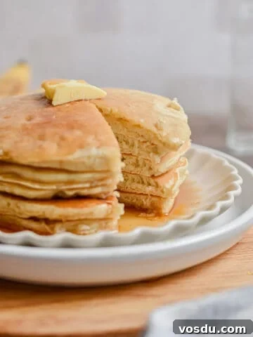 A portion of the bisquick banana pancake stack is missing.