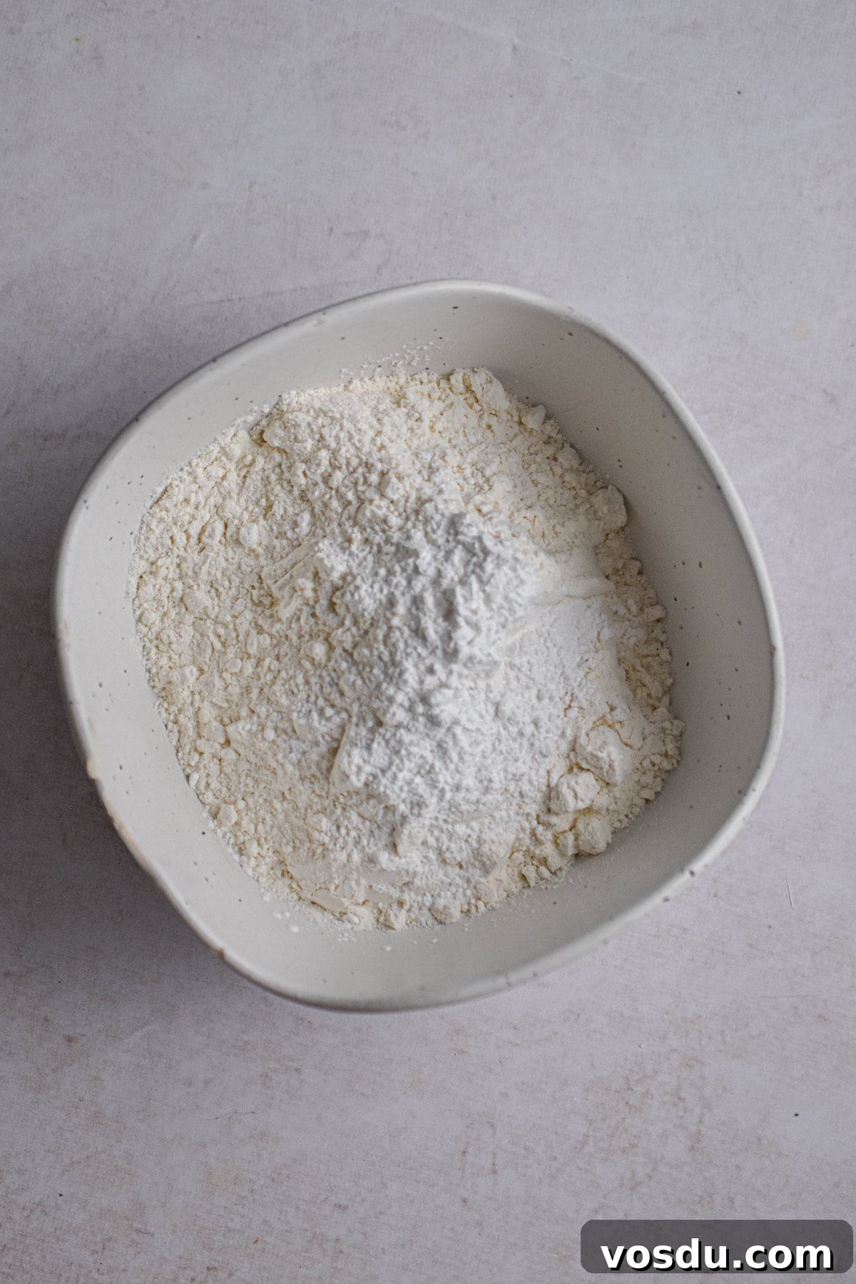 Fluffy Dairy-Free Pancakes Recipe for Breakfast and Brunch 4 The flour is mixed with the baking powder and salt.