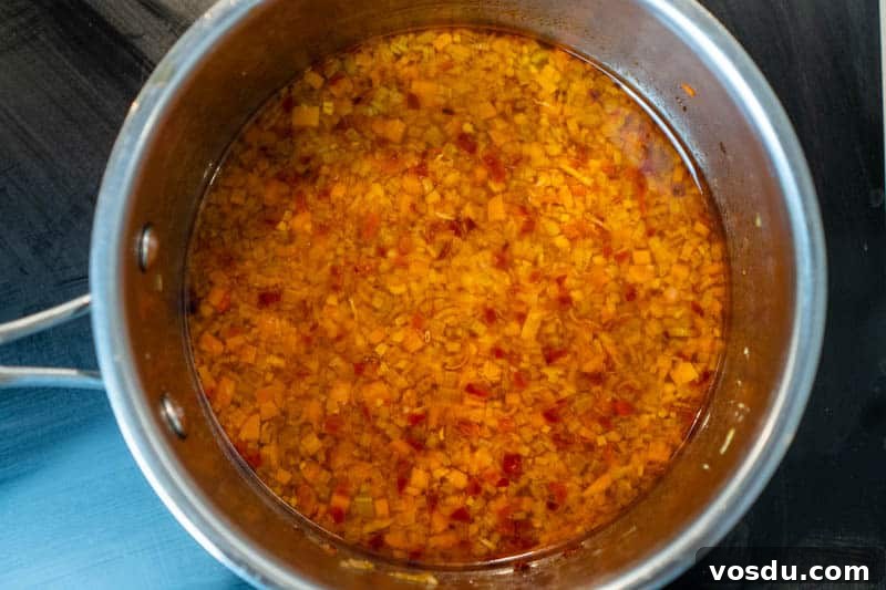Sicilian Couscous alla Trapanese: Authentic Trapani Recipe 4 Adding the stock