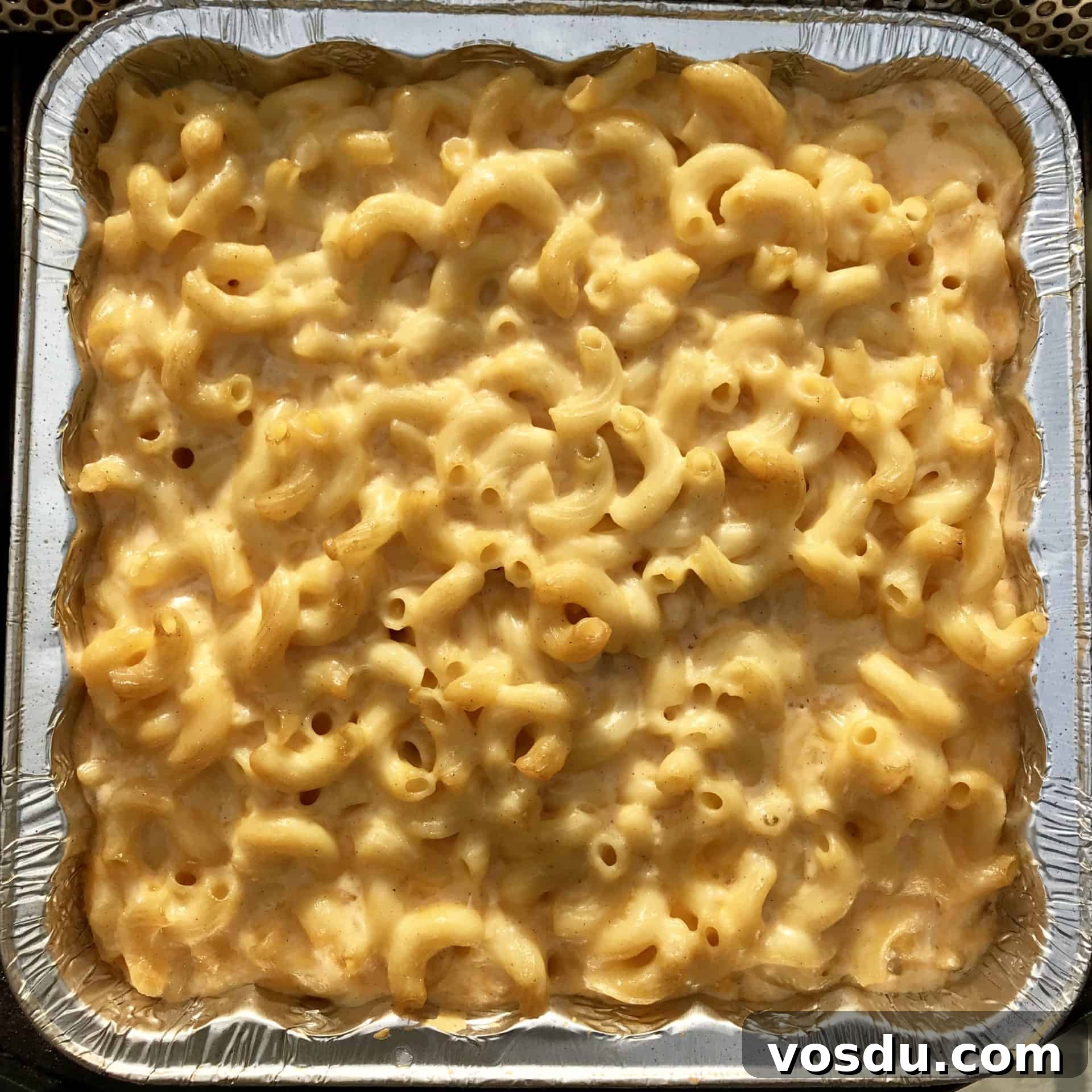 Smoked Macaroni and Cheese Recipe – Creamy, Smoky Comfort Food 2 Smoked Mac and cheese in foil pan overhead shot
