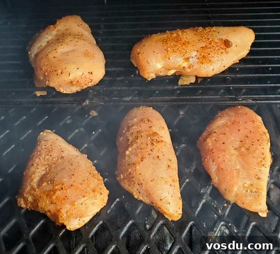 Juicy Smoked Chicken Breast Recipe for Tender, Flavorful Meat 3 Boneless skinless chicken breasts on pit boss pellet grill