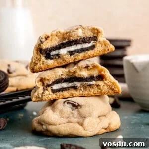 A stack of oreo stuffed chocolate chip cookies.