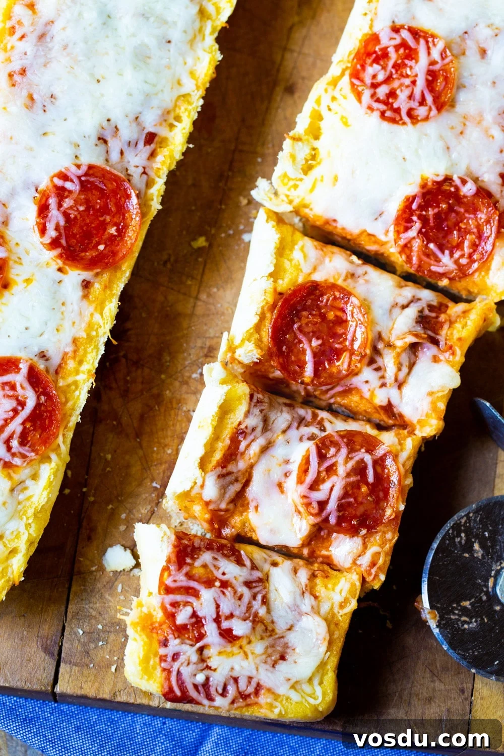 Garlic Bread Pizza: Crispy Cheesy Pizza with Garlic Butter Crust 3 Overhead of two Garlic Bread Pizzas
