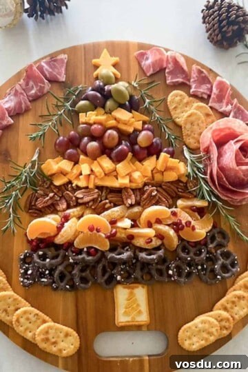 charcuterie board shaped in a christmas tree shape