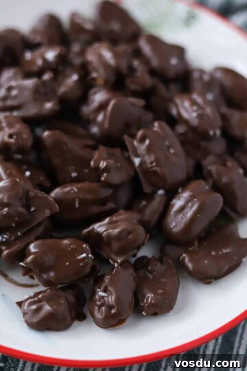 Chocolate pecans on plate.