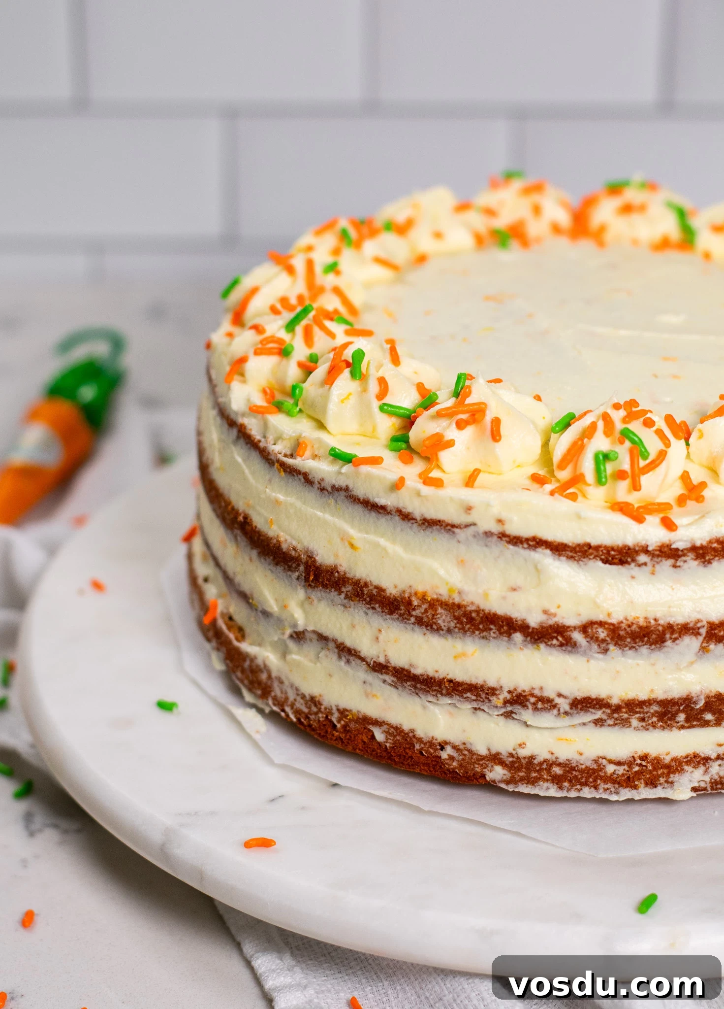 Classic Danish Carrot Cake Recipe with Cream Cheese Frosting 10 A carrot cake with icing.