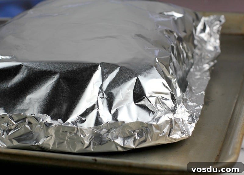 Maple Bacon Turkey Slakers on Hawaiian Rolls 10 view showing the prepared sliders encased in foil