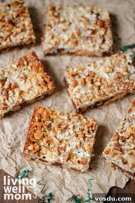 Classic Seven-Layer Bars Recipe with Chocolate and Nuts 5 cookie bars cut into rectangles