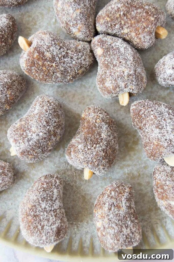 How to Make Authentic Brazilian Cajuzinho: Classic Recipe Guide 8 close up of Cajuzinhos on a greyish platter
