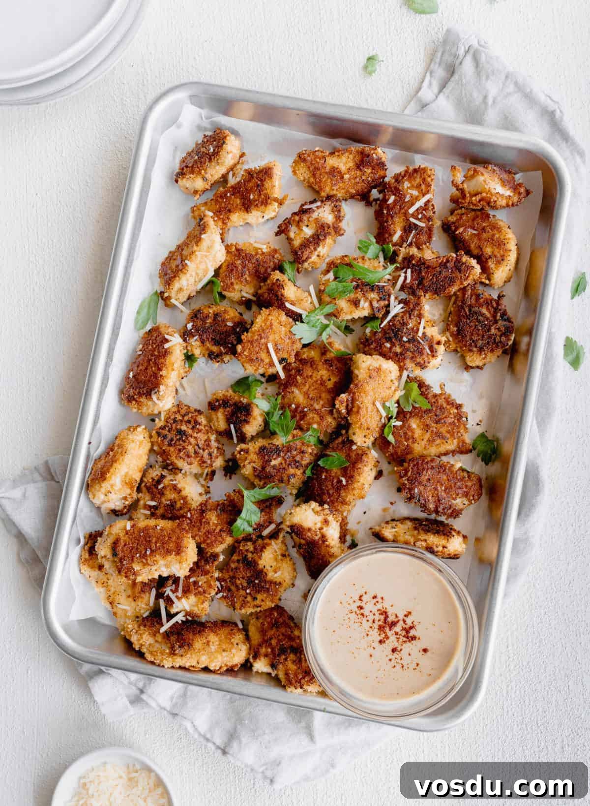 chicken nuggets on pan.