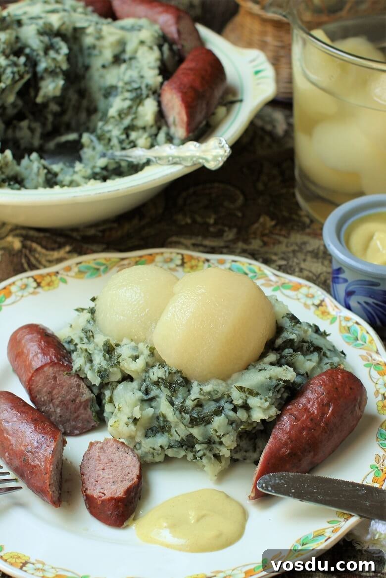 Dutch Kale Stamppot with Sausage — Classic Dutch Comfort Meal 2 a plate of boerenkool topped with pear halves and served with sausages and mustard