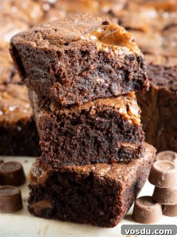 Rolo brownies stacked on top of each other.