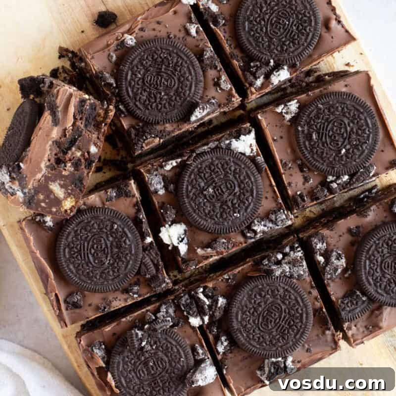 No-Bake Chocolate Oreo Tiffin Recipe — Quick No-Bake Dessert 9 Cut bars of Oreo tiffin.