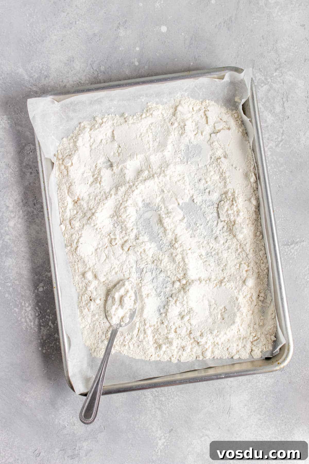 Edible Chocolate Chip Cookie Dough Recipe You Can Eat Raw 5 Flour in a lined sheet pan.