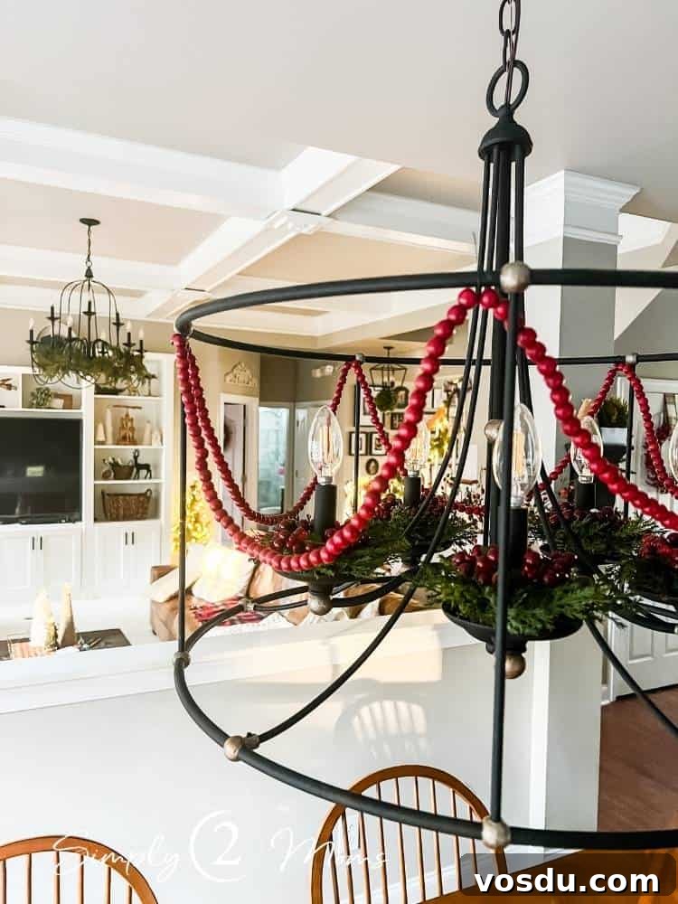 Country Chic Christmas Home Tour That Inspires Holiday Decorating 20 Kitchen chandelier decorated for Christmas